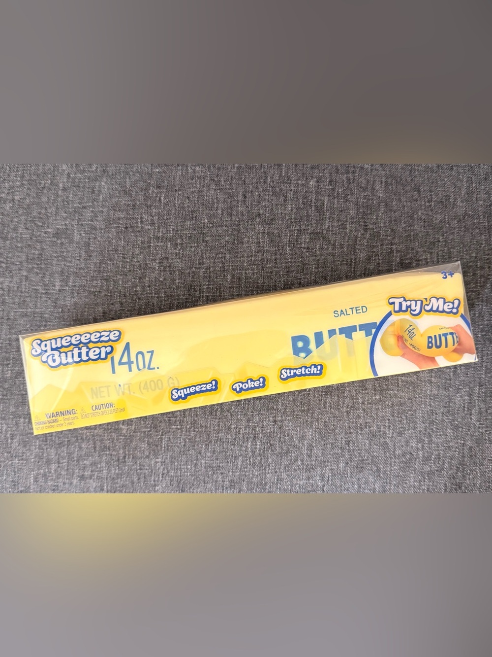 Bright Yellow Butter Stick Packaging - 'Squeeze! Poke! Stretch!'